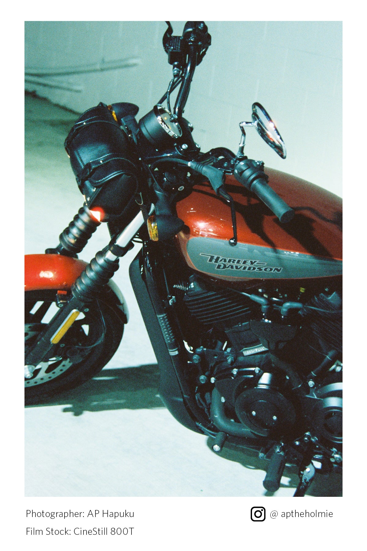 Harley Davidson motorcycle on a light background shot on Cinestill 800T
