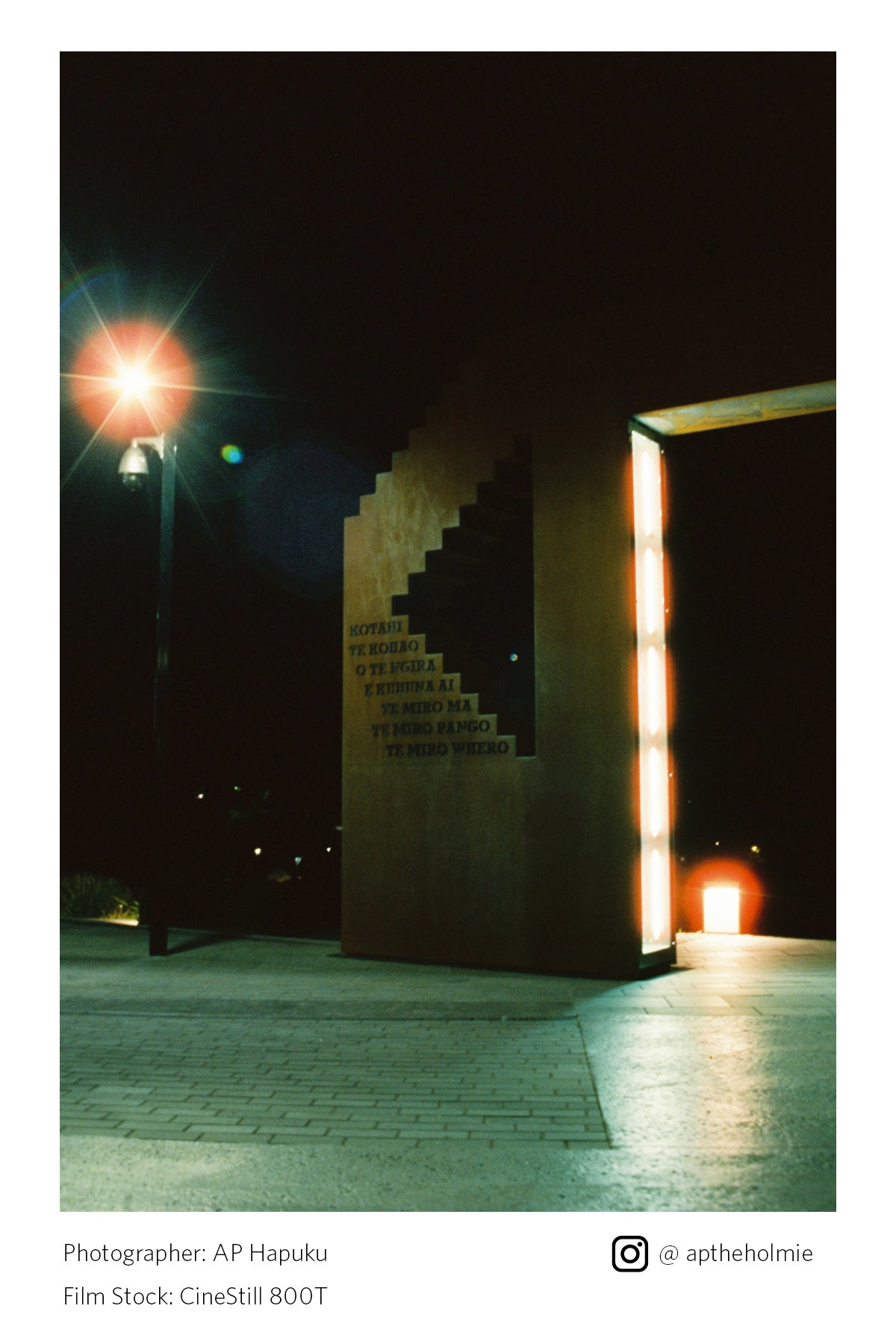 Staircase illuminated by a single light source at night shot on Cinestill 800T